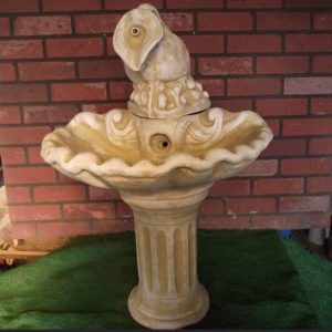 Shell water fountain yellow